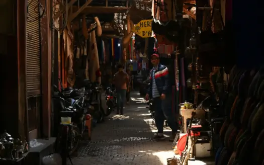 Narrow covered souk street in the Marrakech medina