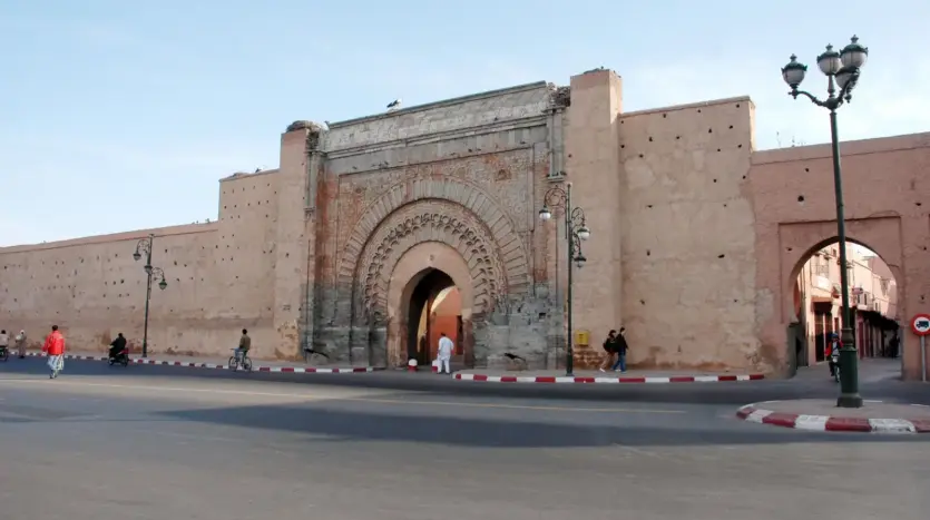 A historic gate in the ochre ramparts of Marrakech