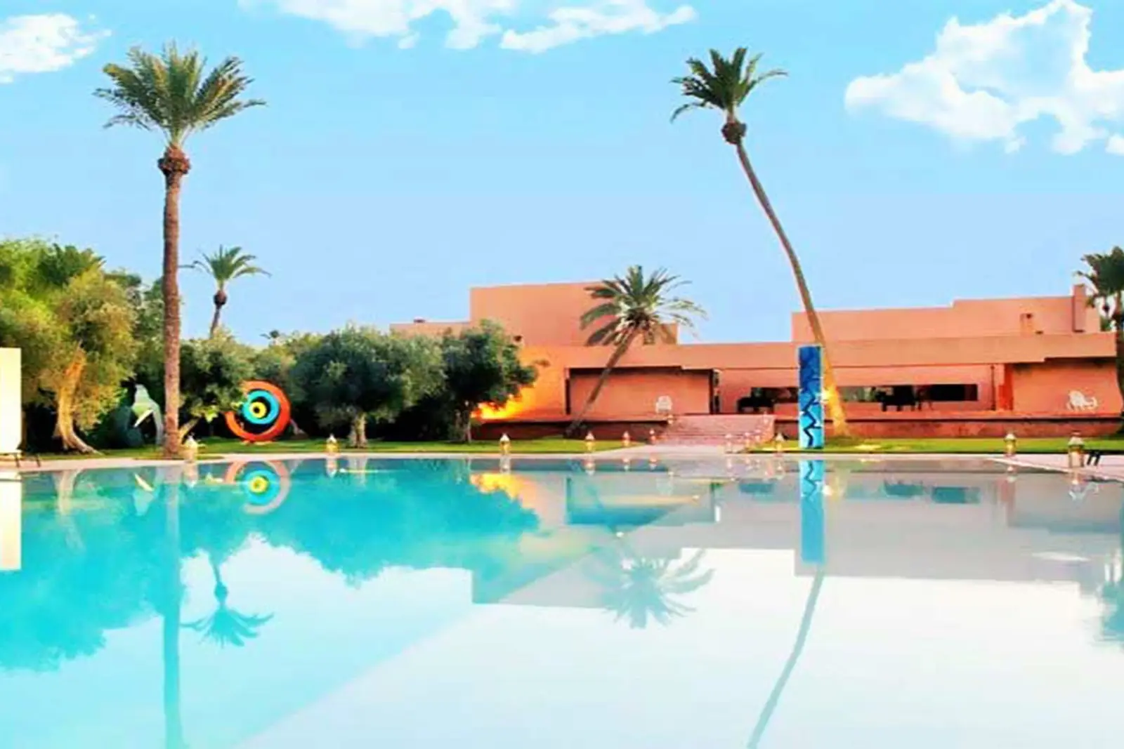 Pool and palm trees at Villa Savannah, Marrakech