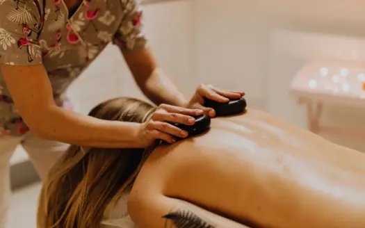 Hot-stone massage in a spa