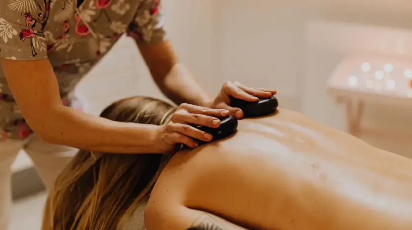 Hot-stone massage in a spa