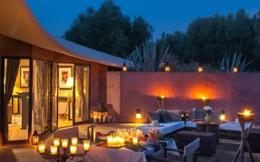 Candlelit terrace of Olive Palace in the evening