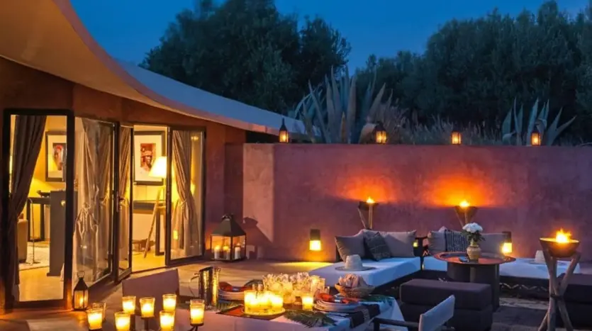 Candlelit terrace of Olive Palace in the evening