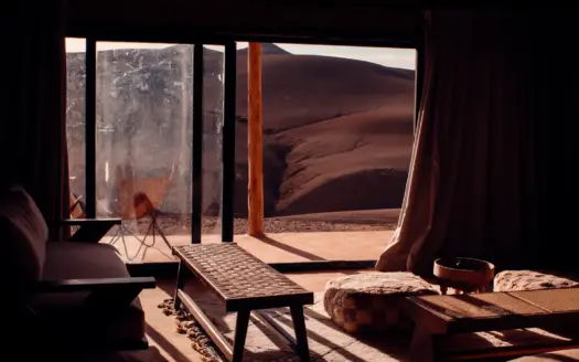 Tent interior opening onto the stony Agafay desert