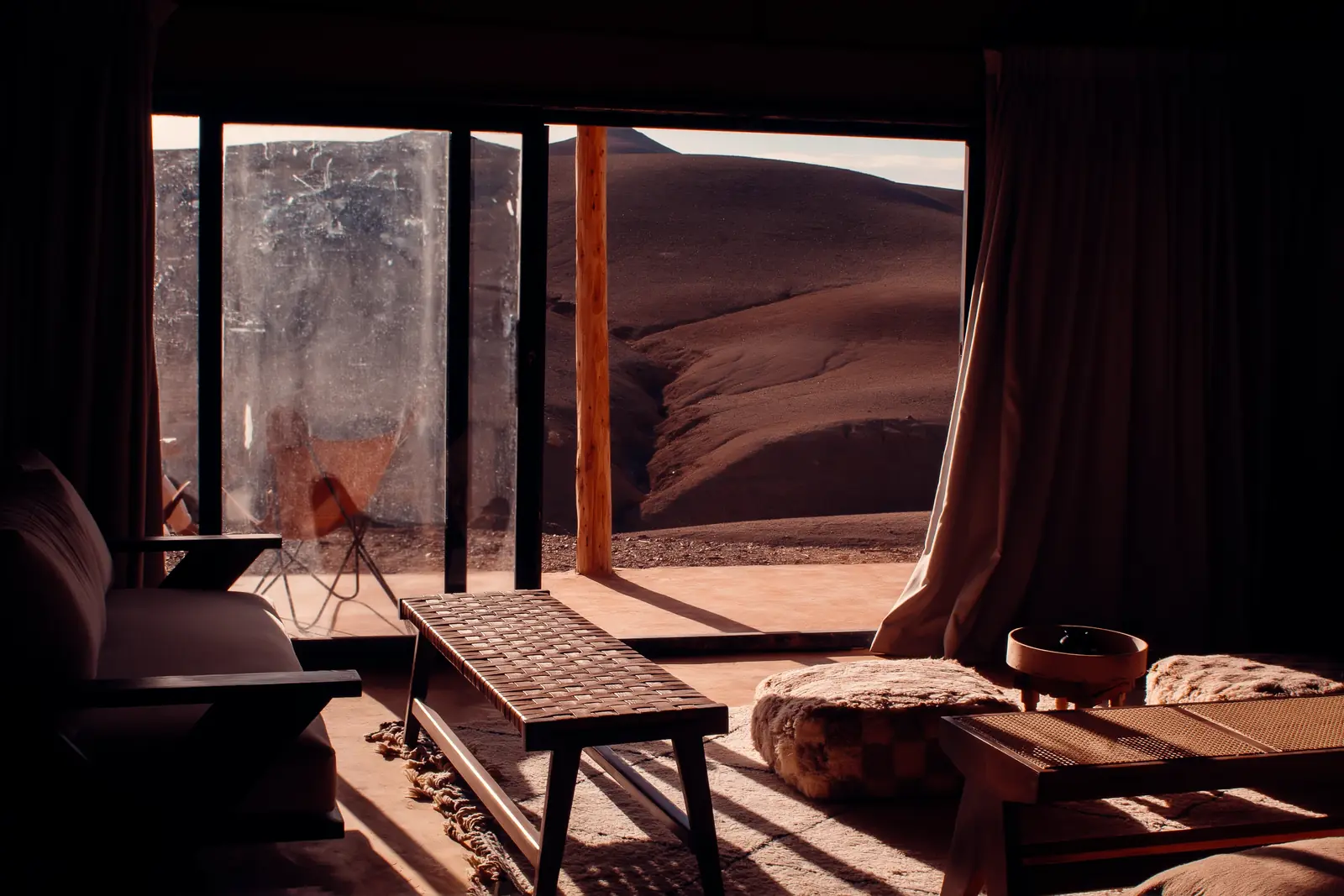 Tent interior opening onto the stony Agafay desert