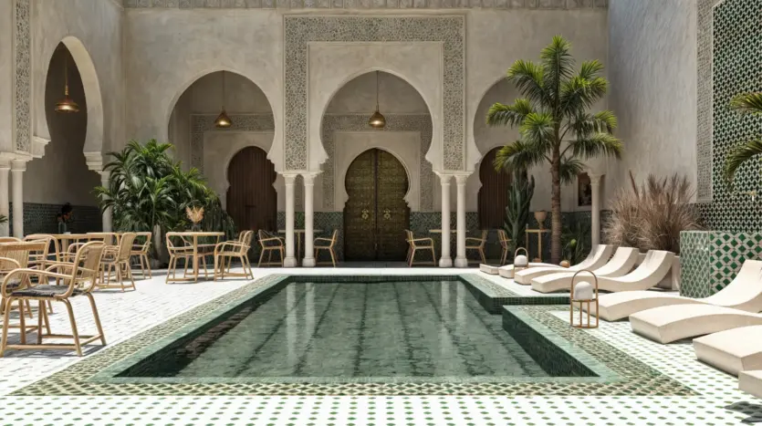 Patio de riad avec piscine, arcades et transats