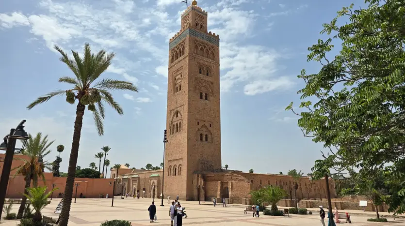The Koutoubia minaret in Marrakech seen from the esplanade on a sunny day